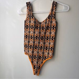 Free People Orange and Black Patterned Bodysuit xs/s NWT